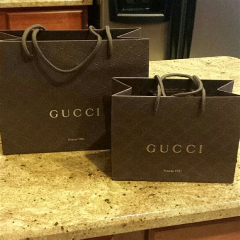 gucci less than 100|Gucci shopping bag.